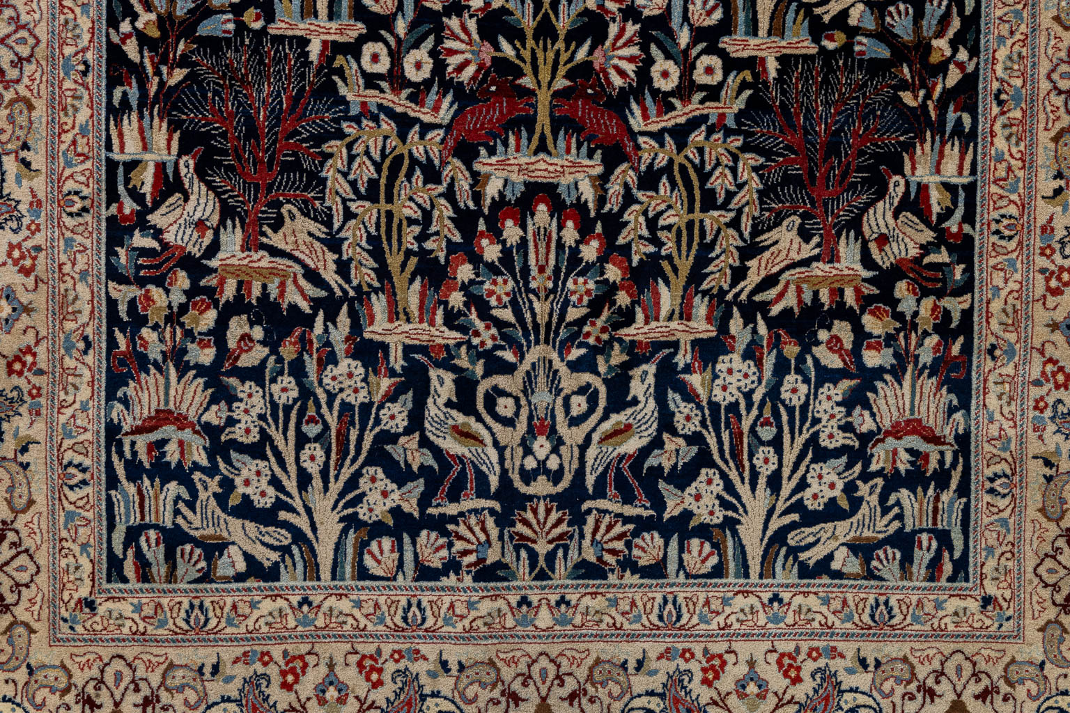 An Oriental hand-made carpet, birds and trees, Isphahan/Isfahan. (L:181 x W:107 cm)