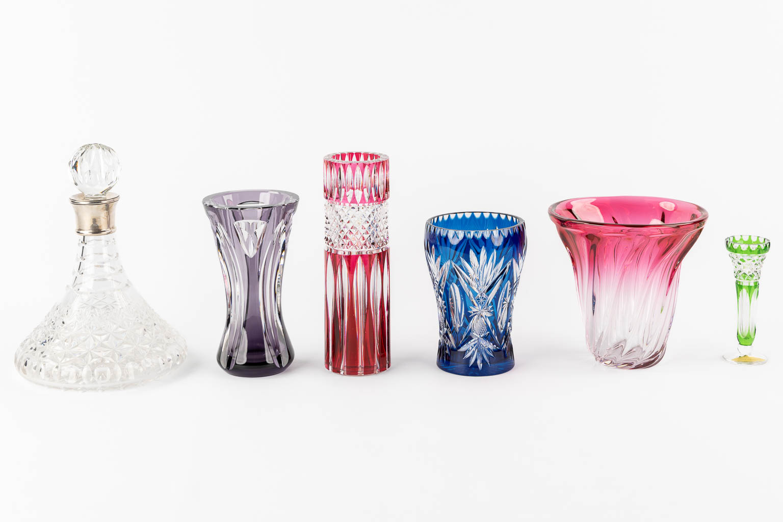 Val Saint Lambert and others, a carafe and five vases. Cut and coloured crystal. 