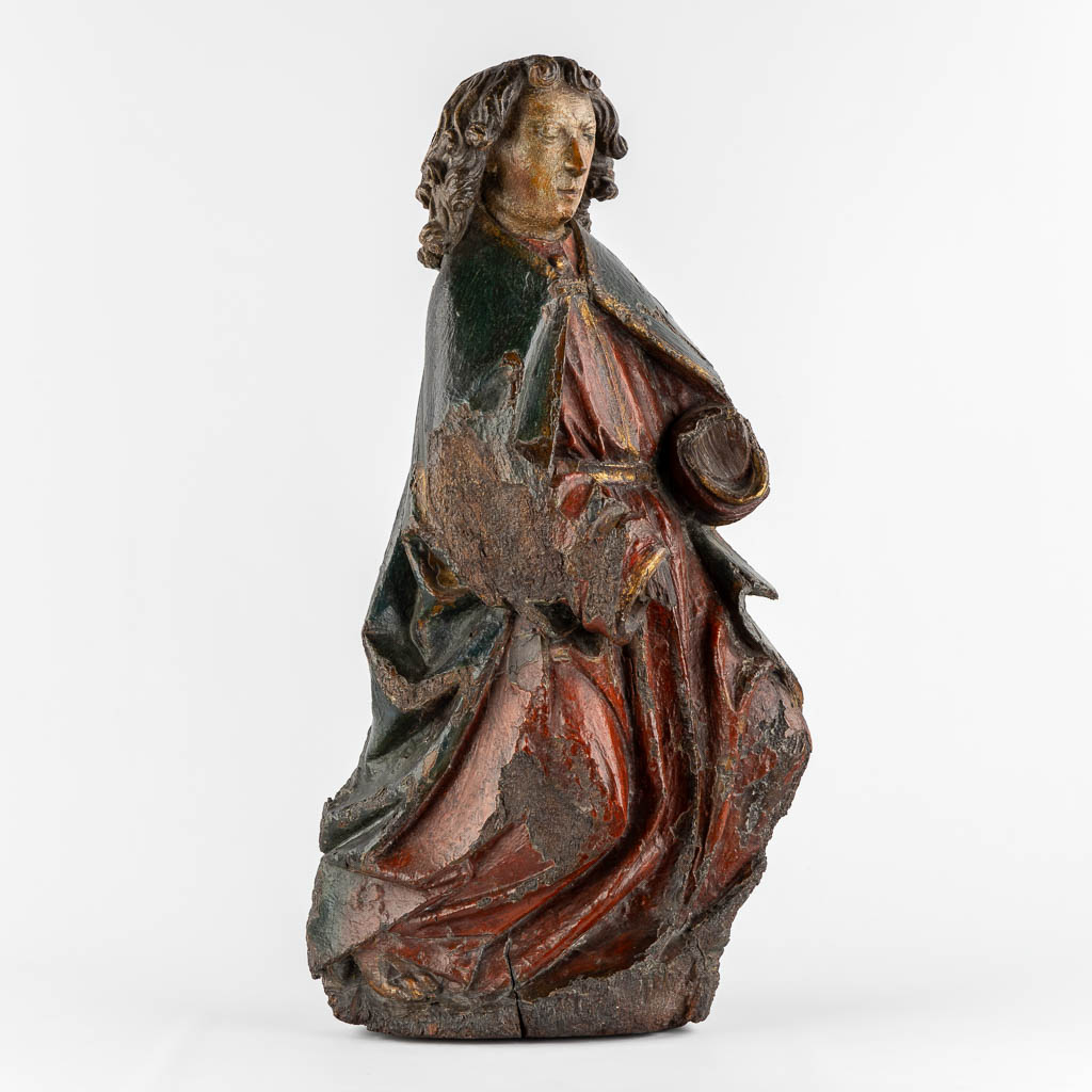 A large Gothic wood sculpture of an Angel, Rhineland, Germany, 14th/15th C.  (L:20 x W:36 x H:71 cm)