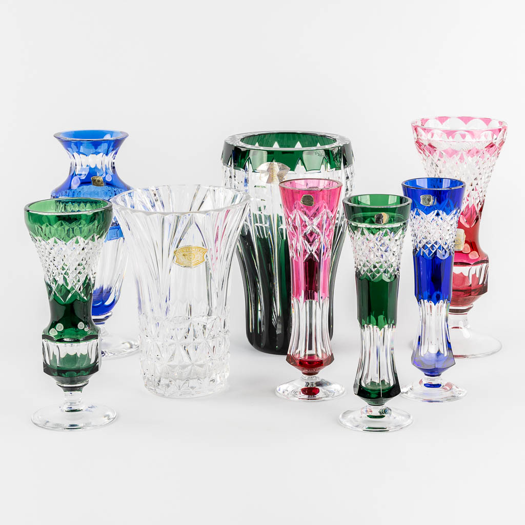 Val Saint Lambert, eight cut and coloured crystal vases. 