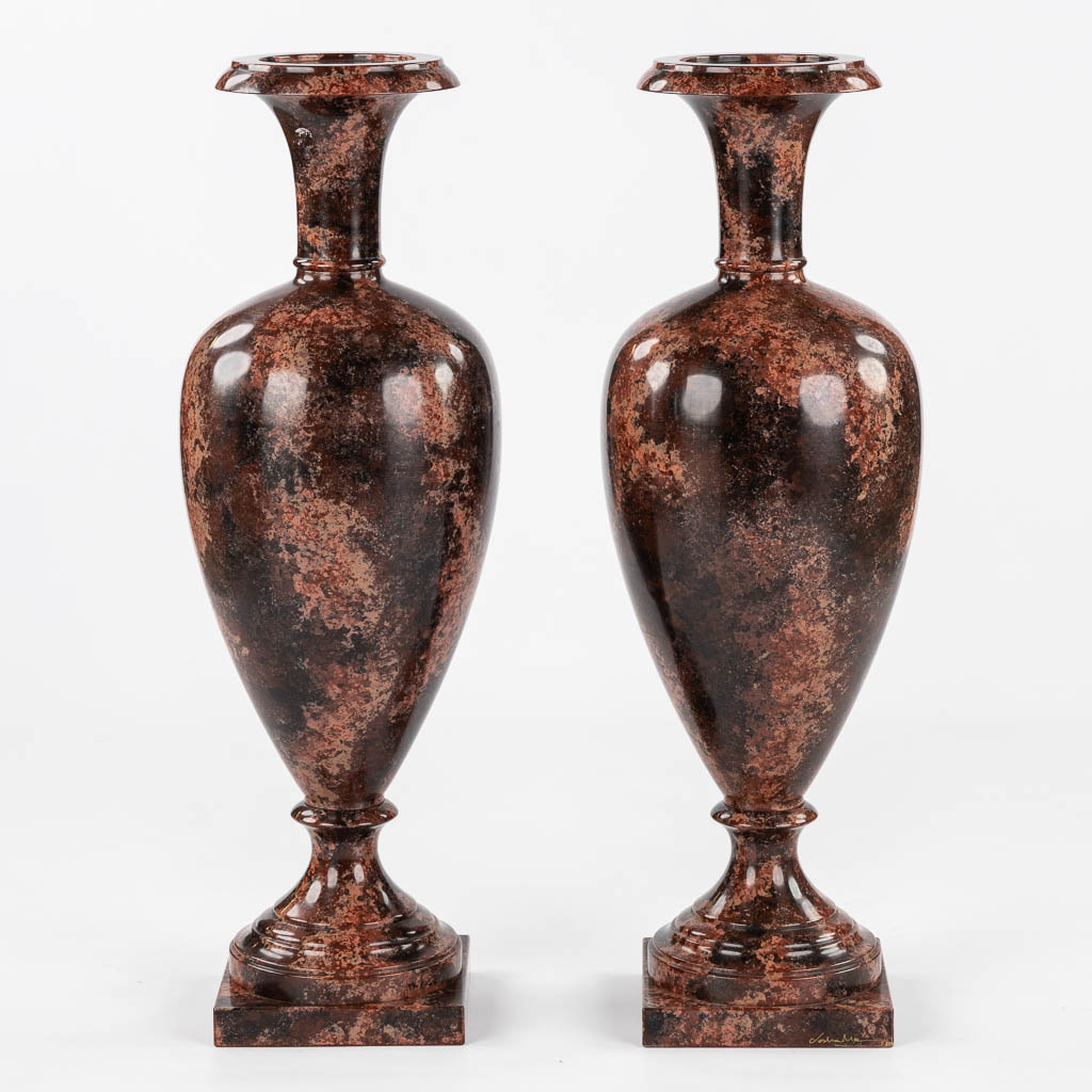 a pair of vases, wood turned and with a 'Faux Marble' decor, 20th C.