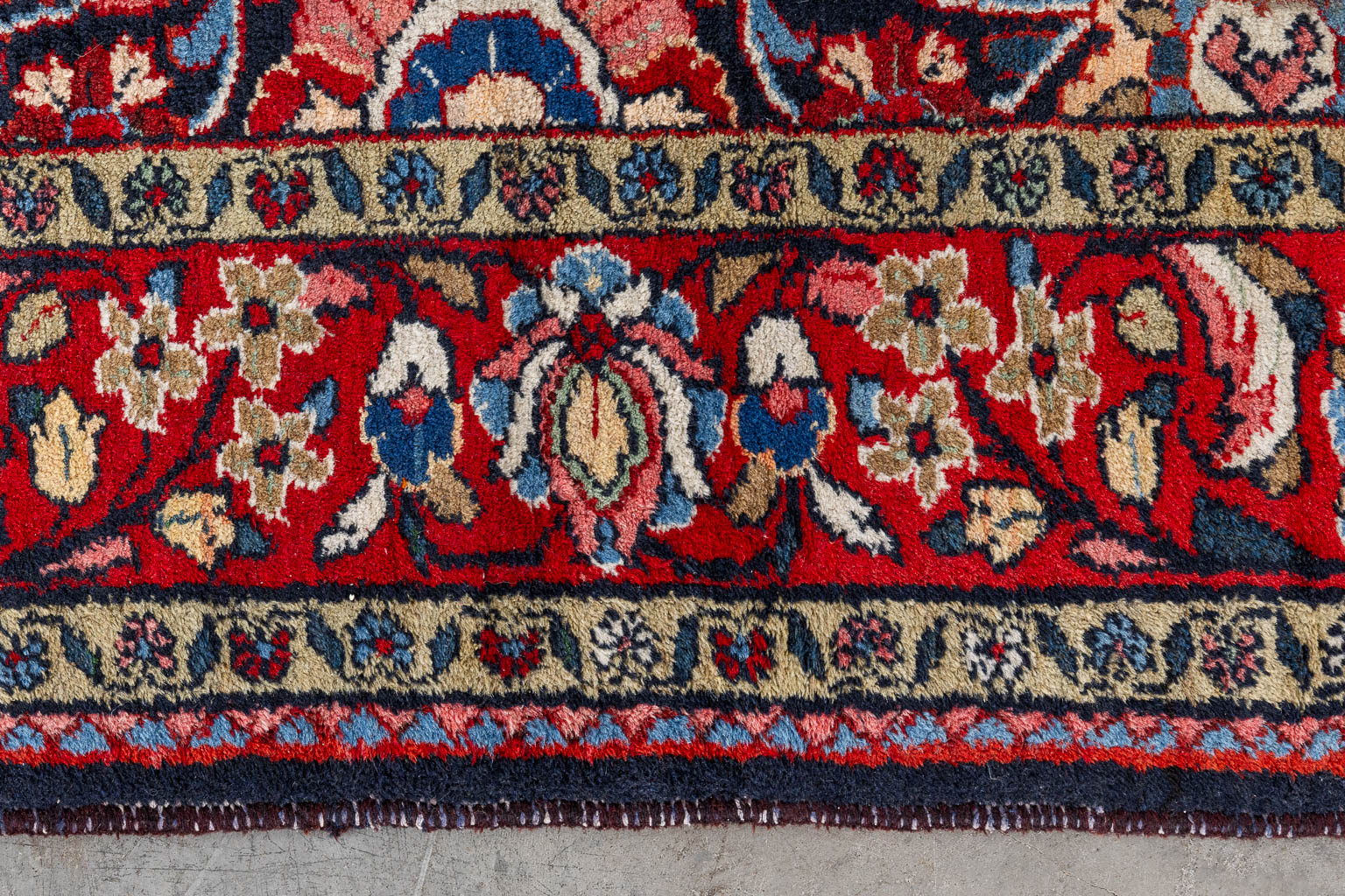 A hand-made carpet. (L:327 x W:222 cm)