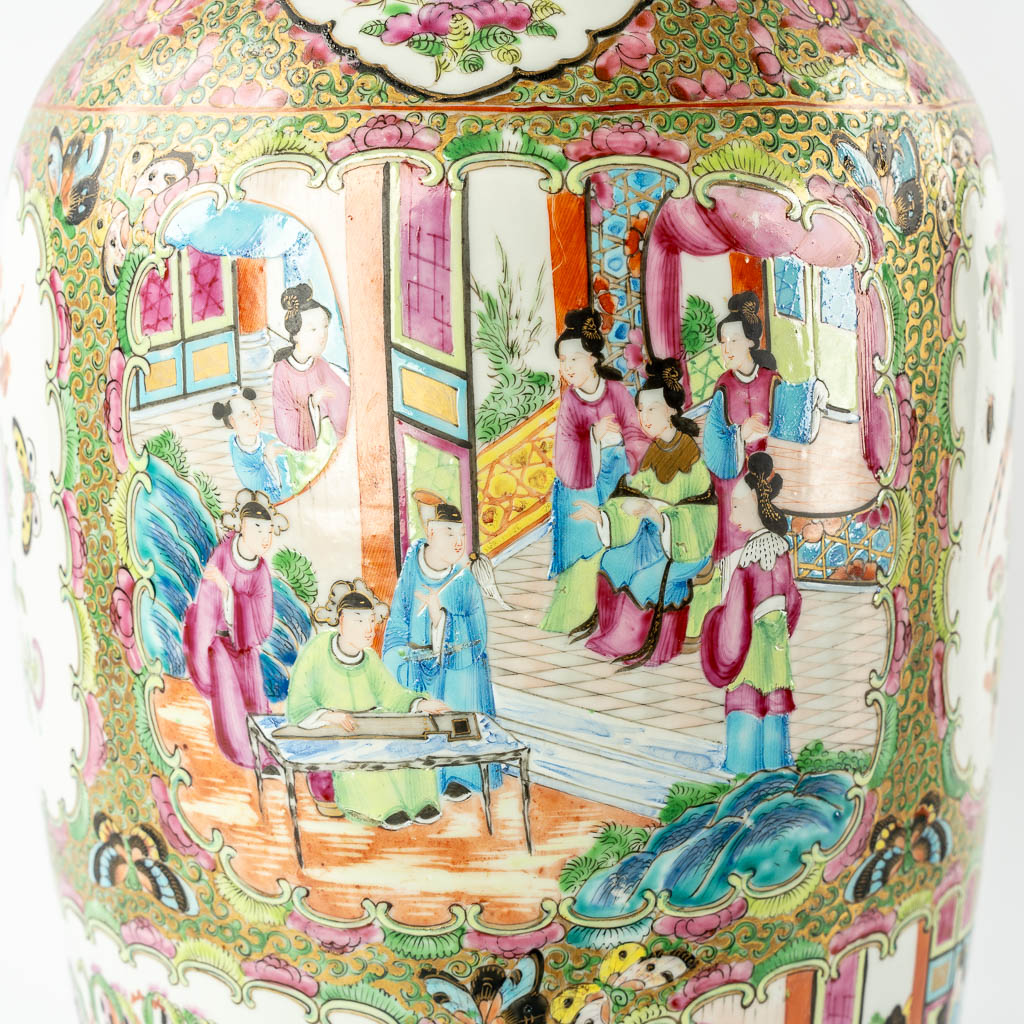 A pair of Chinese Canton vases, decorated with Ladies, fauna & flora, 19th C.