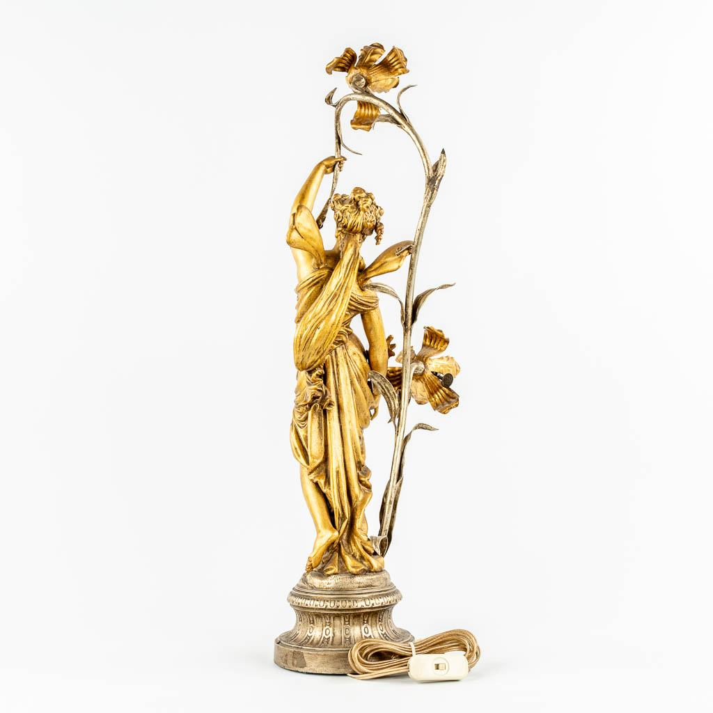 A table lamp with an Angel or Nimph, gilt spelter. (c.1900). 