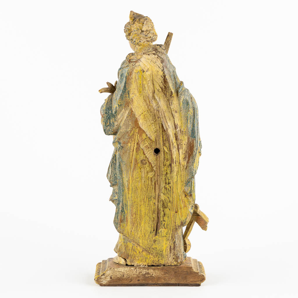 Saint Catherine, an antique wood sculpture, probably 18th C. (L:8 x W:13 x H:32 cm)