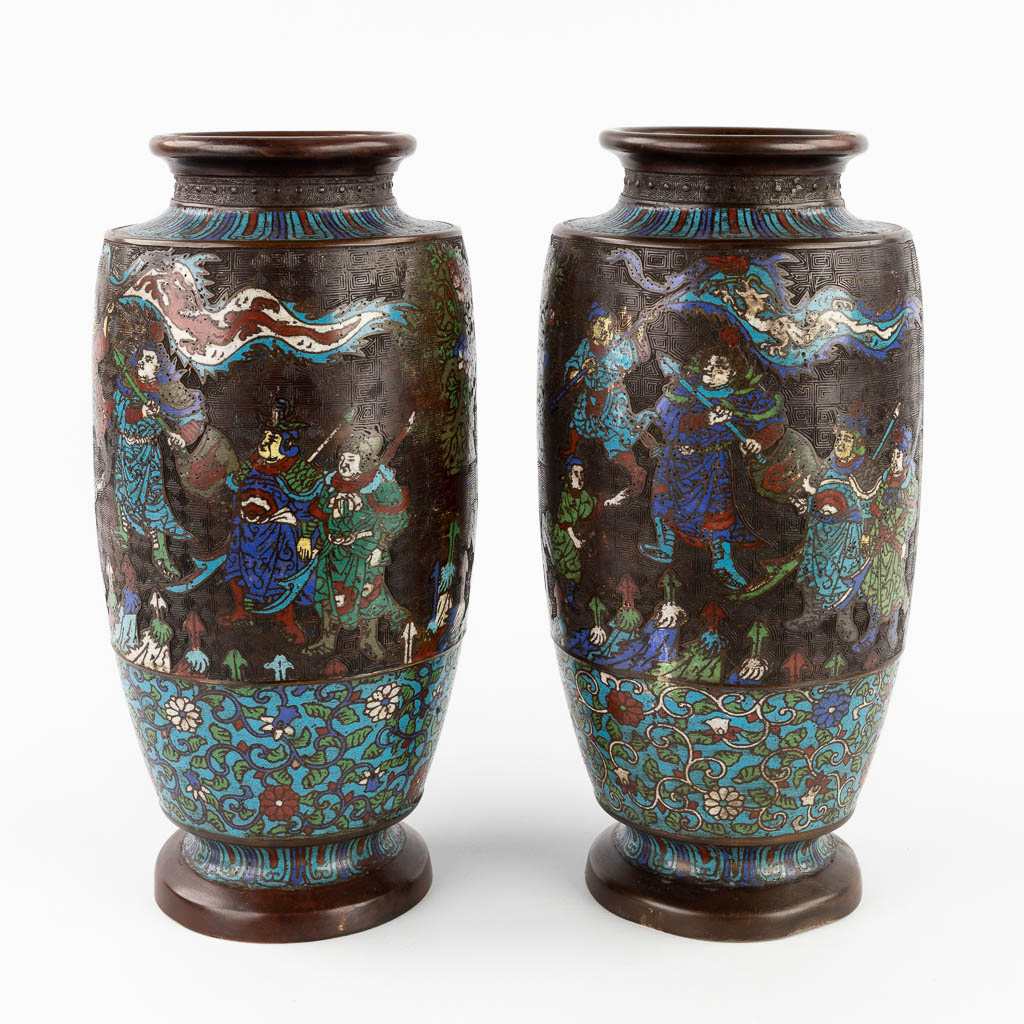 A pair of bronze vases with Champslevé decor. 19th C. (H:40 x D:20 cm)