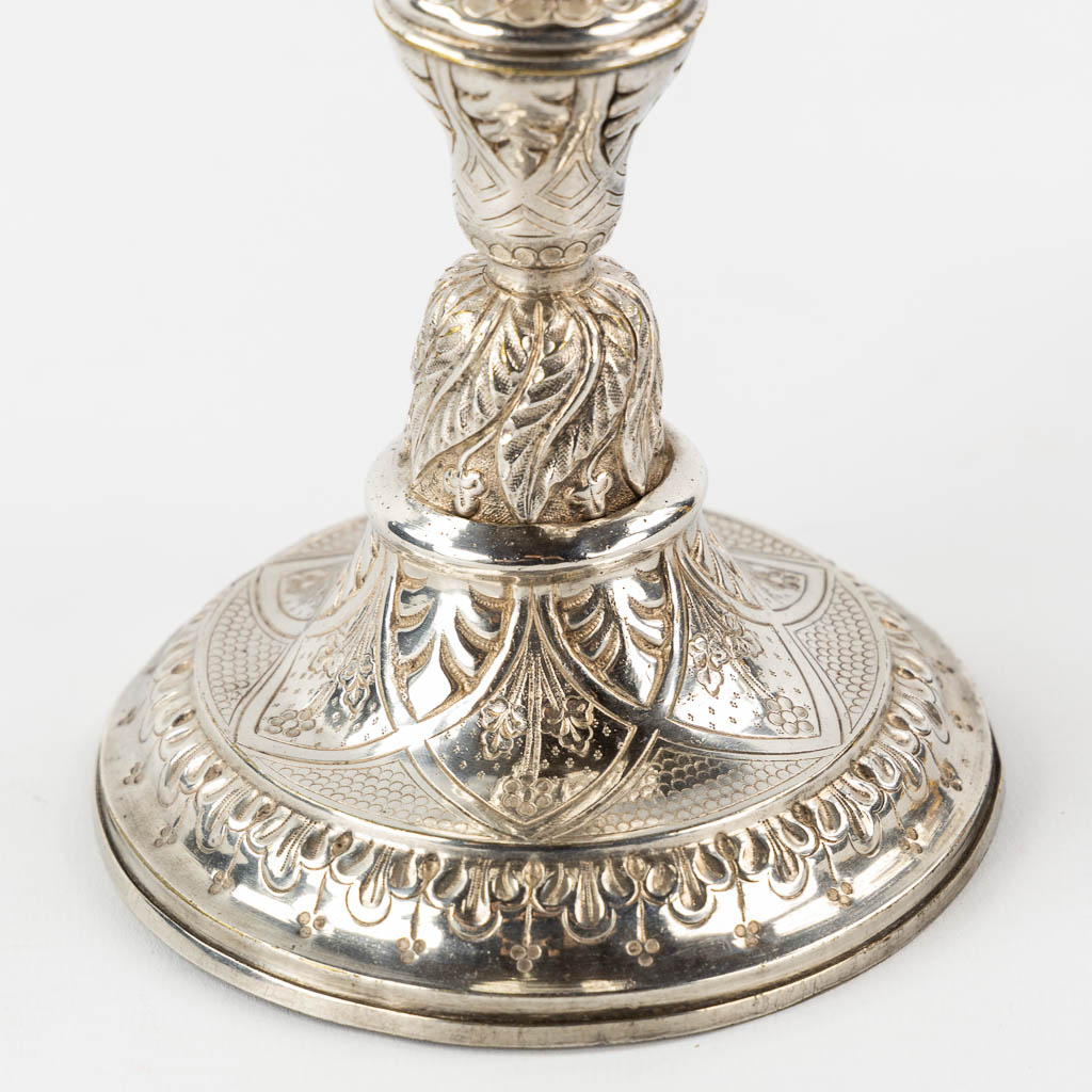 Two chalices with a silver cuppa, on a silver-plated and copper base.