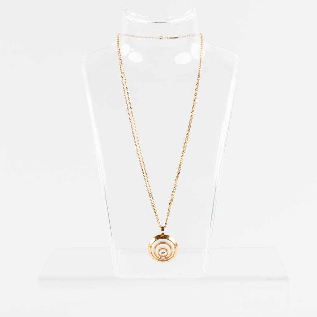 Chopard, 'Happy Spirit', a pendant with a diamond. 18kt yellow gold. 19,4g. (W:2,3 x H:3 cm)