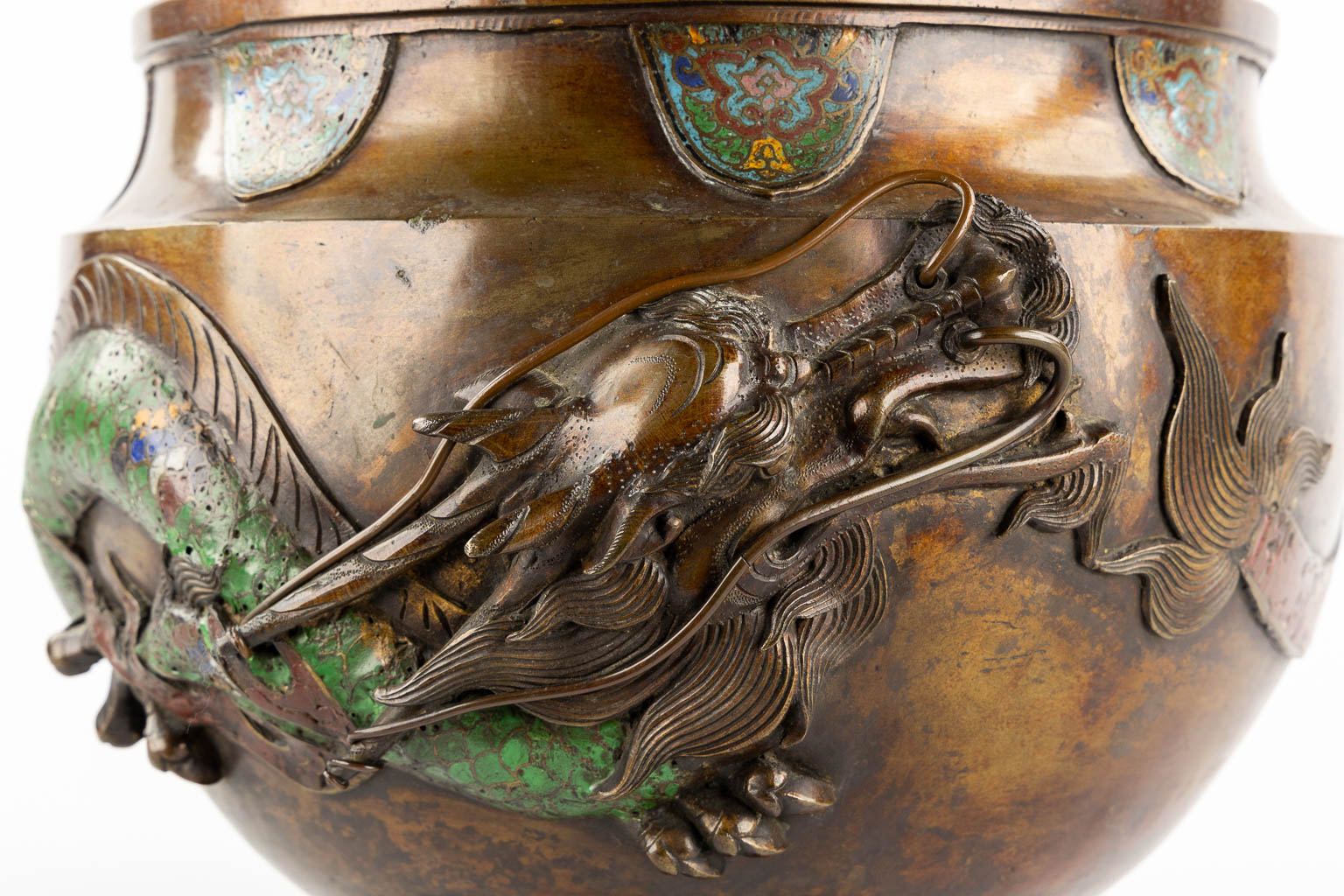 A Jardinière or Cache-Pot, Relief dragon decor and finished with Chamsplevé enamel. (H:27 x D:38 cm)