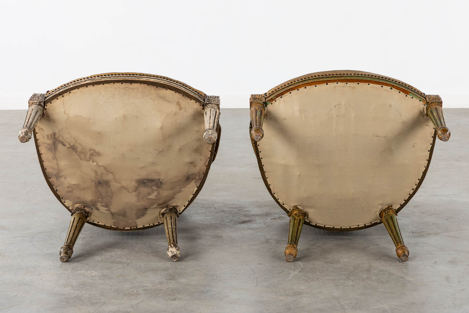 A pair of antique patinated chairs, Louis XVI style. (L:58 x W:57 x H:83 cm)