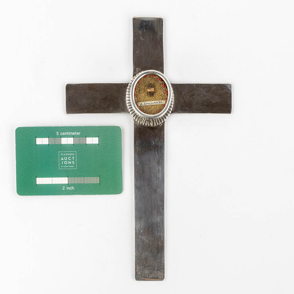 A relic 'S. Cruxis DNJC', The True Cross of Jesus Christ, mounted in a silver holder. 