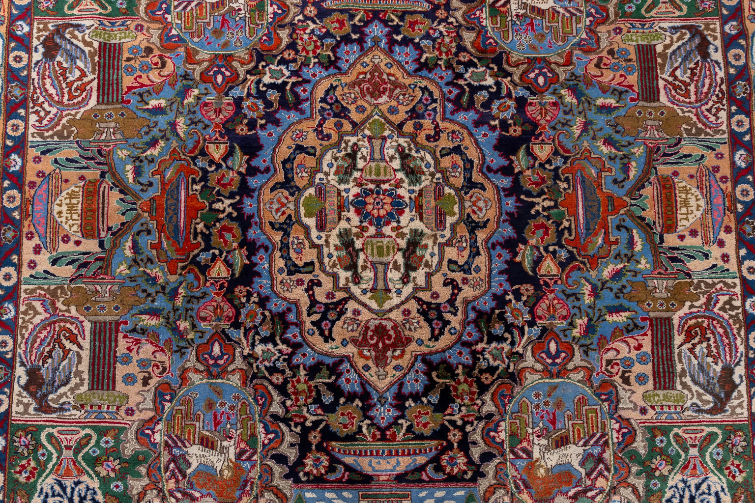 An Oriental hand-made carpet, Kashmar. (L:372 x W:305 cm)