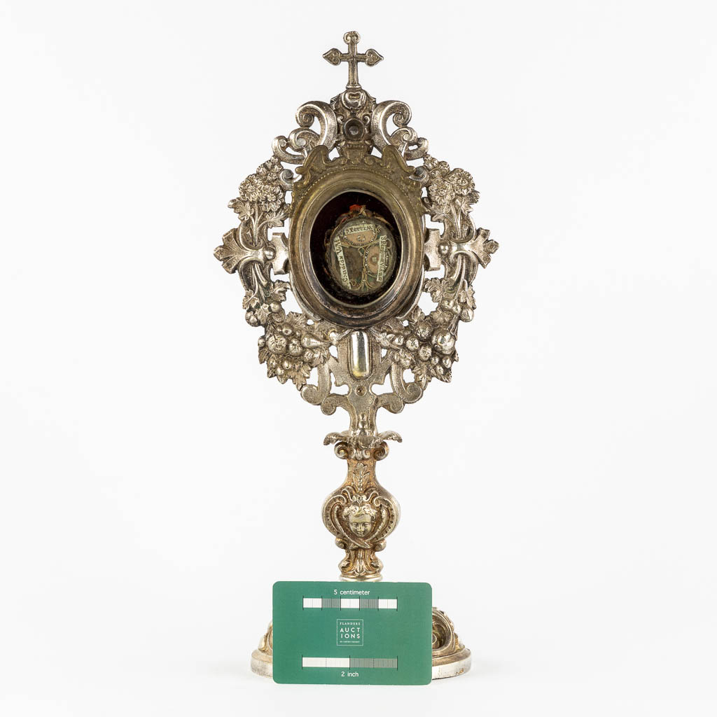 A Reliquary Monstrance, Baroque Style with a theca and 3 relics for Saints. 19th C.