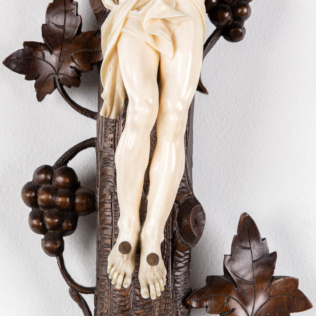 A wood-sculptured crucifix with an ivory 