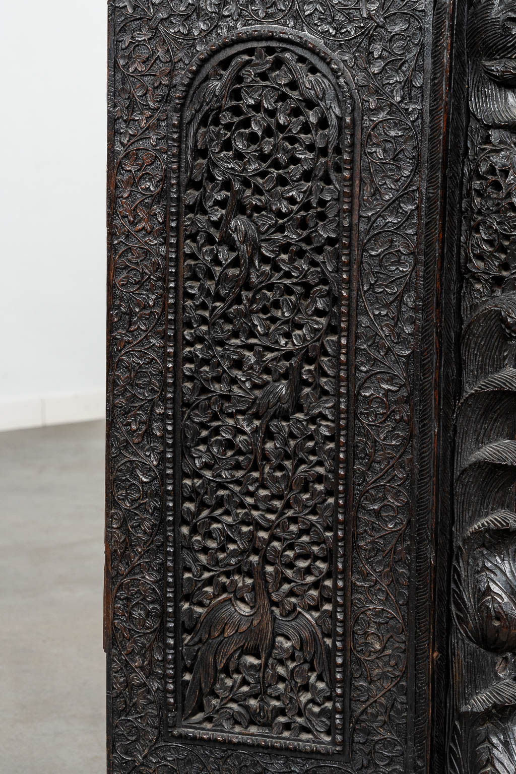 An antique and decorative cabinet, hand-sculptured hardwood. Birma/Myanmar. Circa 1920.