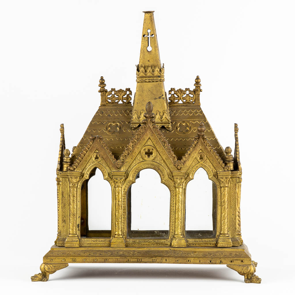 A Reliquary Shrine shaped like a Gothic Revival chapel, gilt bronze.