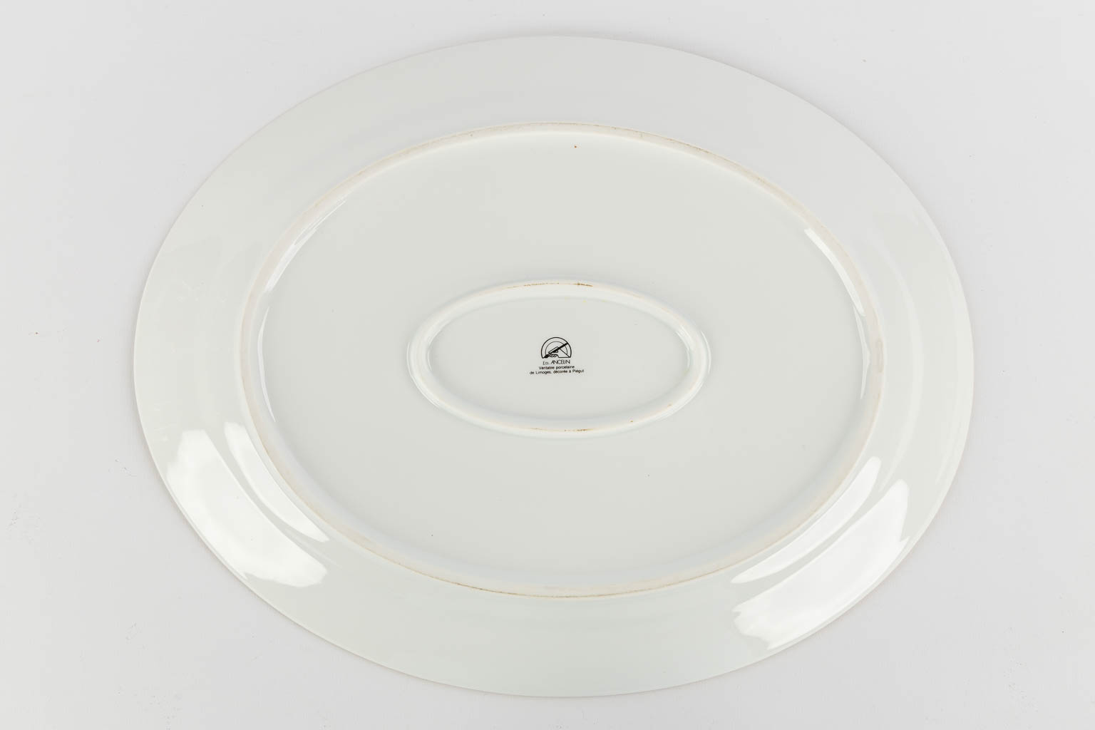 Limoges, a collection of fish-, cheese- and dinner plates. Porcelain. (L:31 x W:39 cm)