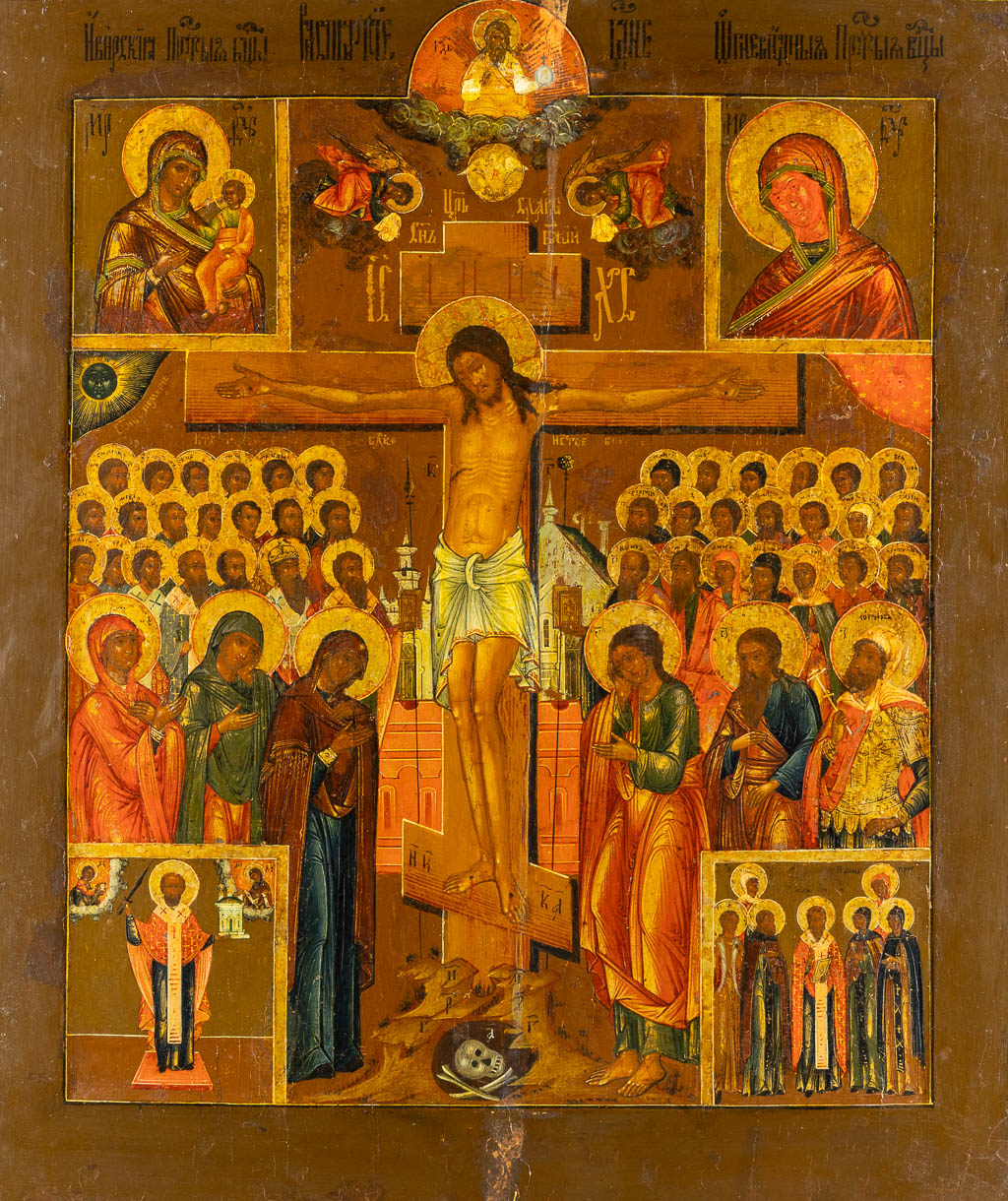 A Crucifixion Icon, Saint Nicholas, Mother God and various other saints. 19th C. (W:45,5 x H:53 cm)