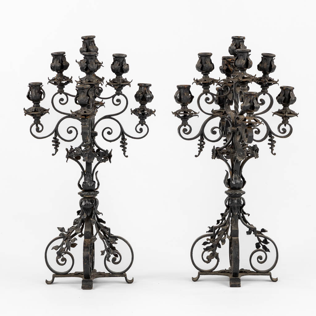 A pair of wrought-iron candelabra. Circa 1900. (L:31 x W:31 x H:57 cm)