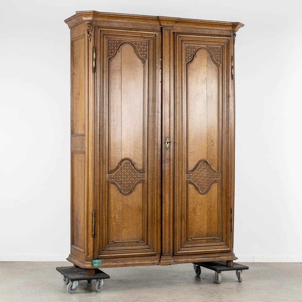 A two-door wardrobe, Louis XIV, 18th C. (L:63 x W:168 x H:235 cm)