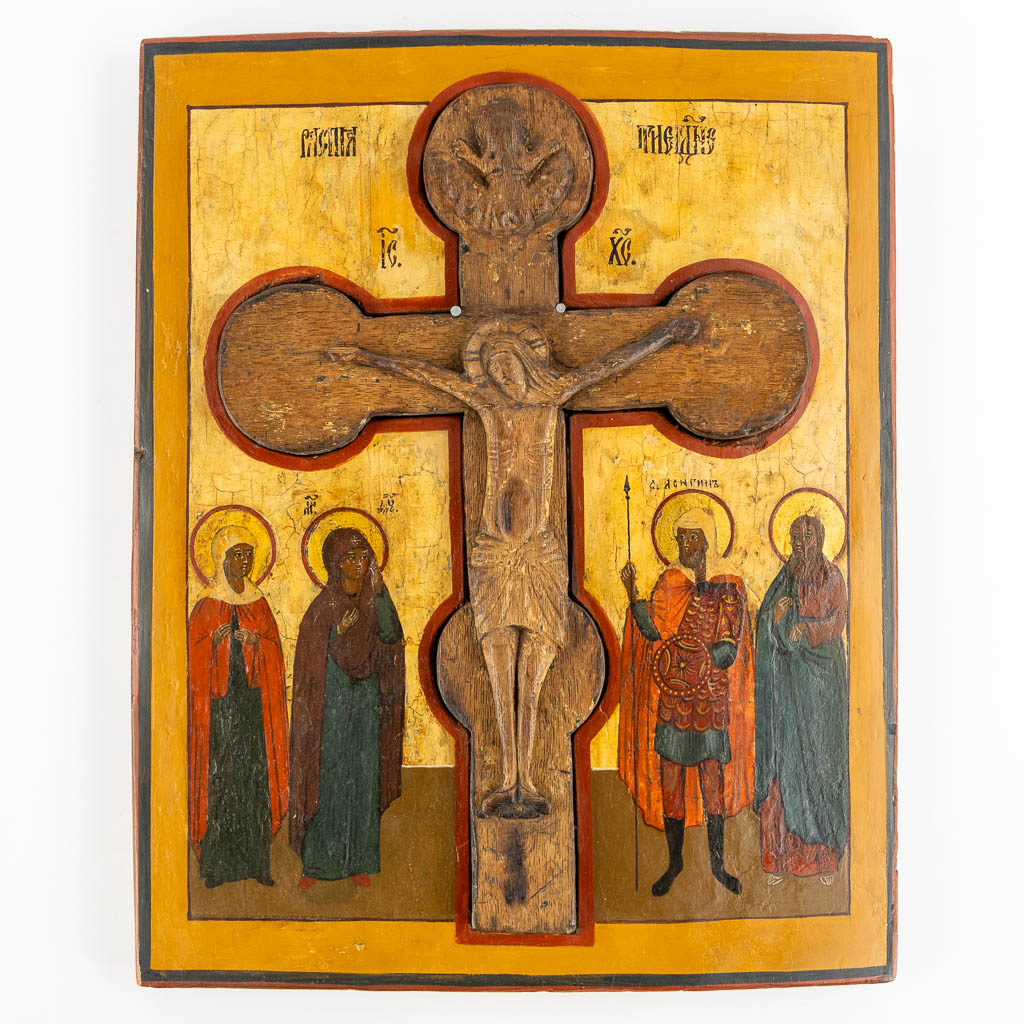 An antique Russian Icon 'The Cruxifixtion', 19th C. (W:32 x H:40 cm)