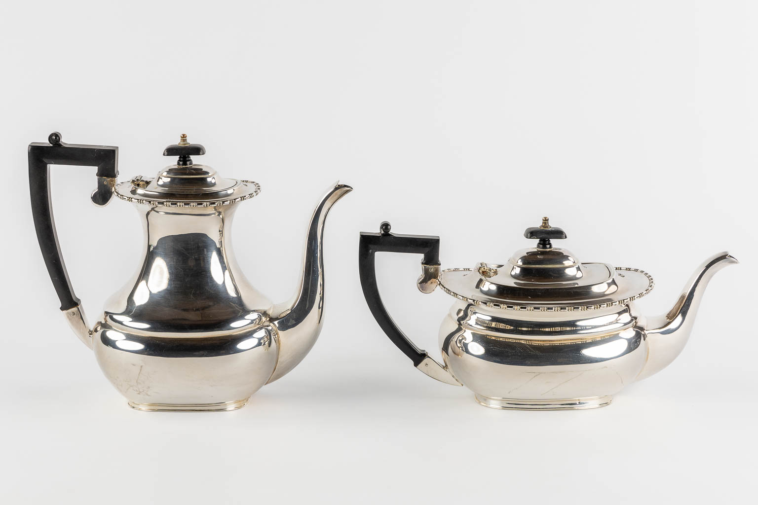 A 5-piece coffee and tea service, Silver-Plated, Sheffield UK. (L:38 x W:59 cm)