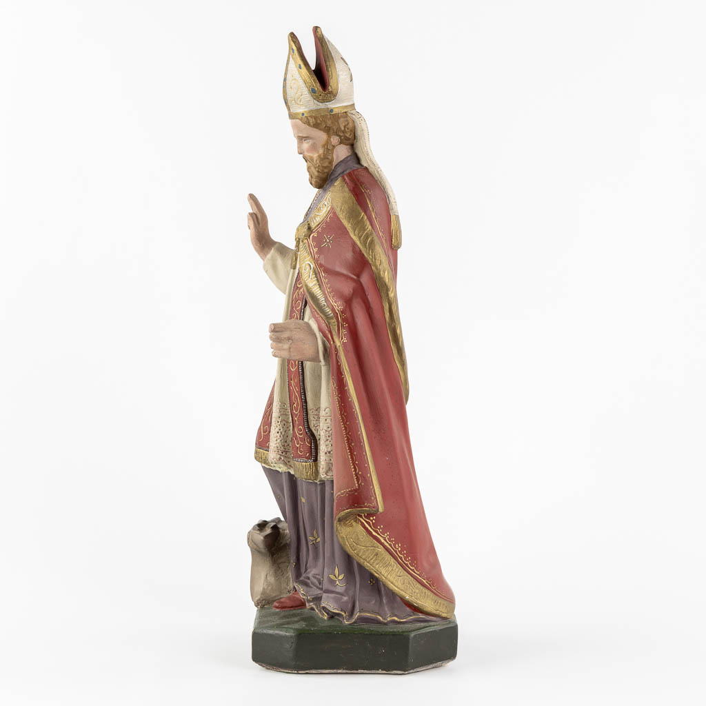 Saint Eligius, polychrome plaster. (W:19 x H:52 cm)