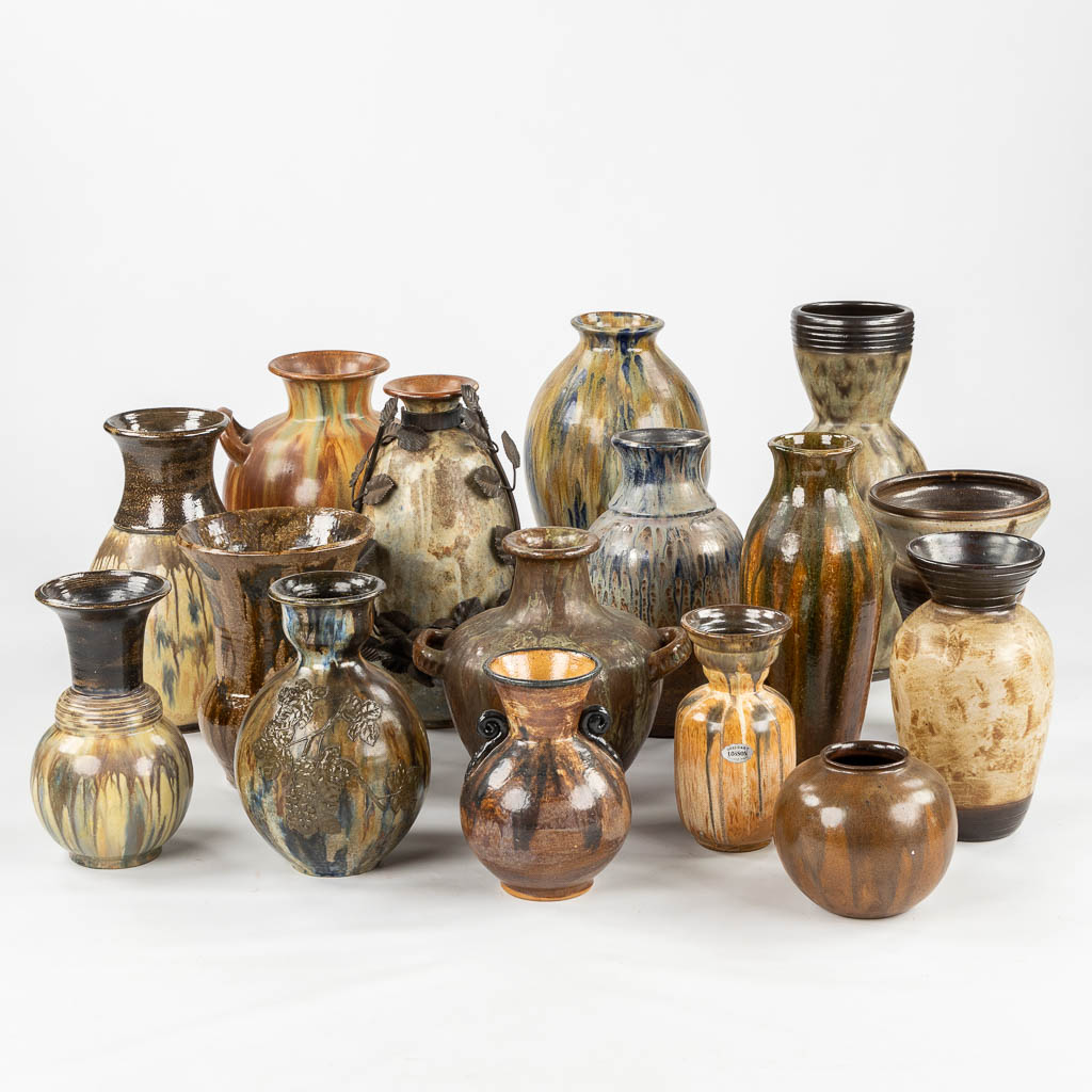 Sixteen vases and jugs, Guérin, Dubois, Losson, Bouffioulx. (H:47 cm)