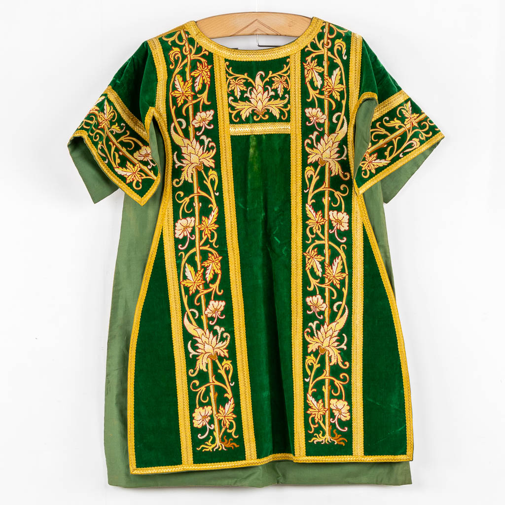 A set of Dalmatics and a Roman Chasuble, added a Chasuble and stola, maniple. Embroideries. Made around 1910.  Church use.