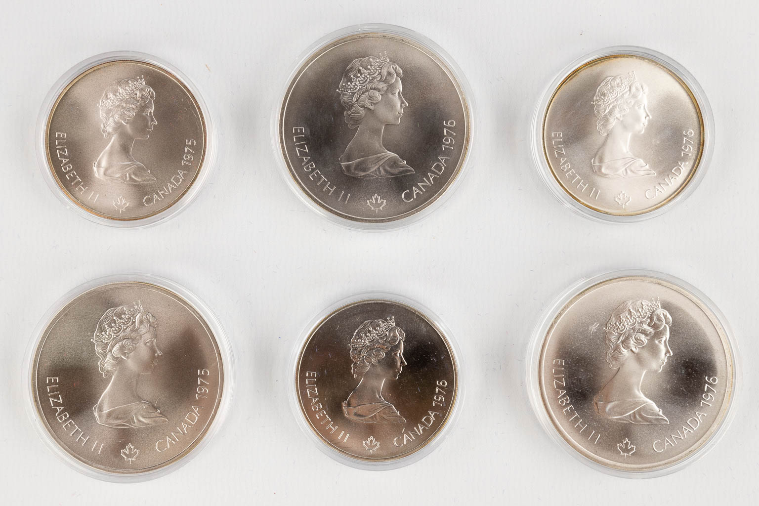 Canadian Olympic Silver Coins 1976, for the Olympic games in Montreal. (D:22,5 x W:40 x H:5 cm)