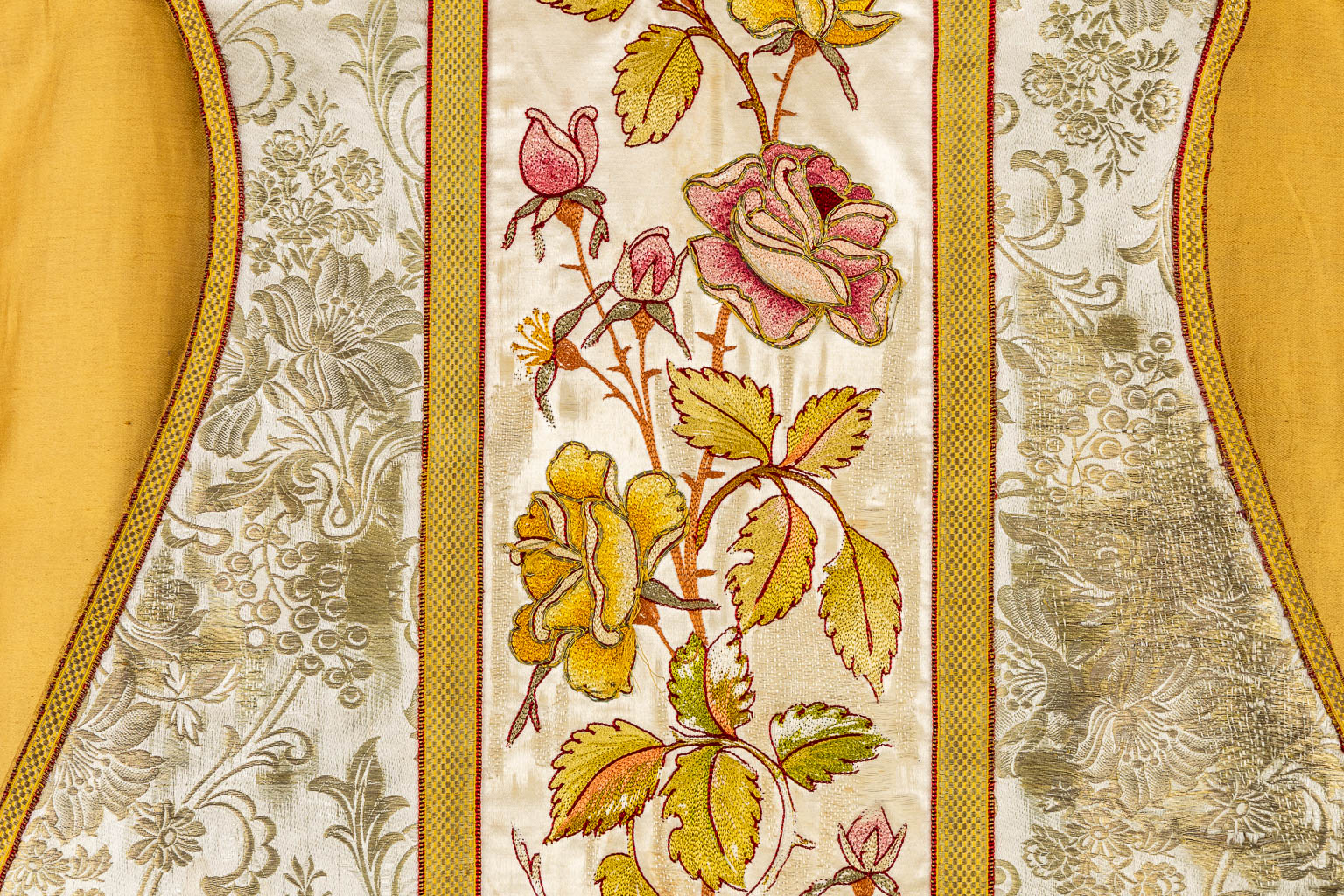 A pair of Dalmatics and three Roman Chasubles, Thick Gold Thread and embroideries.