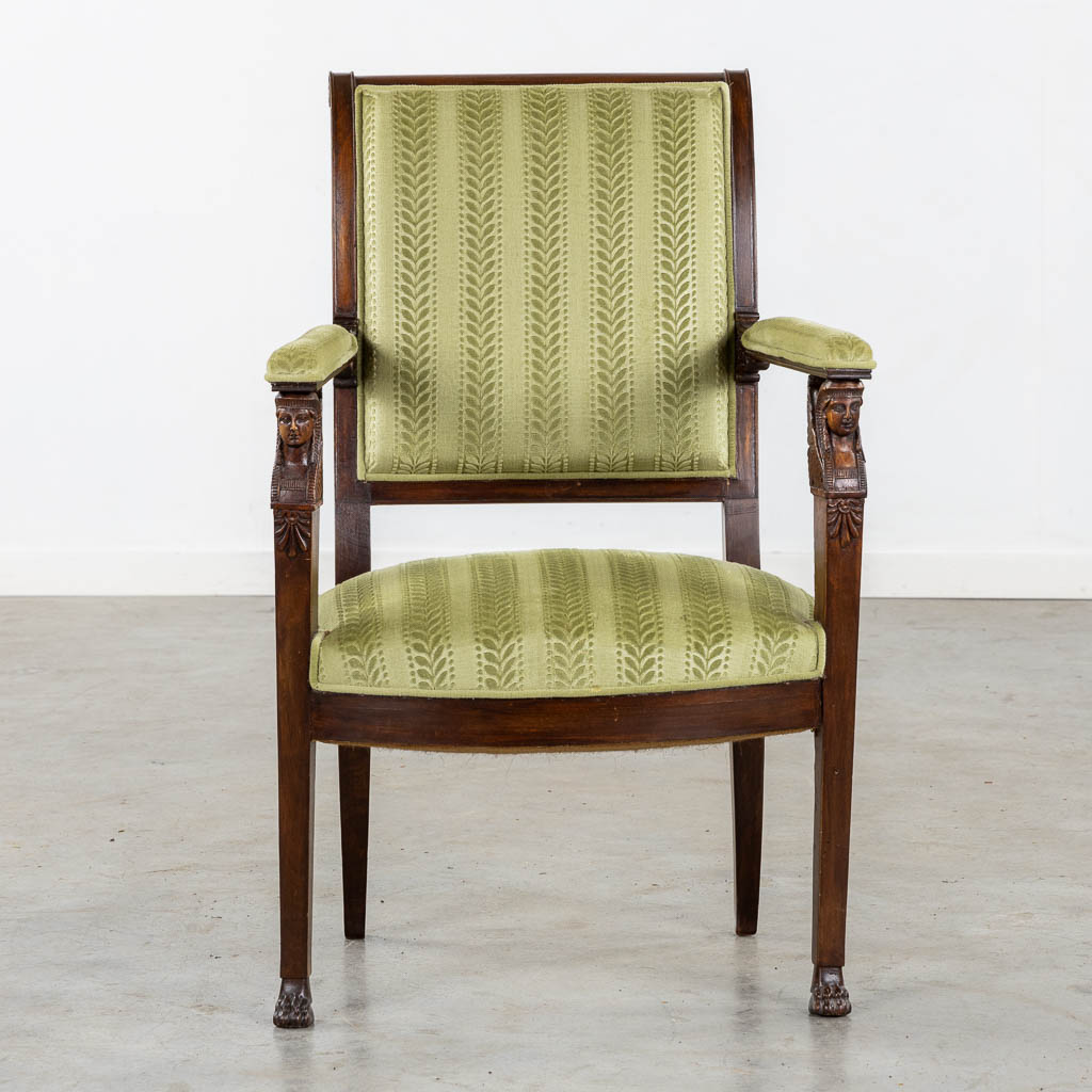 An antique armchair, sculptured wood in Empire style. (L:60 x W:59 x H:91 cm)