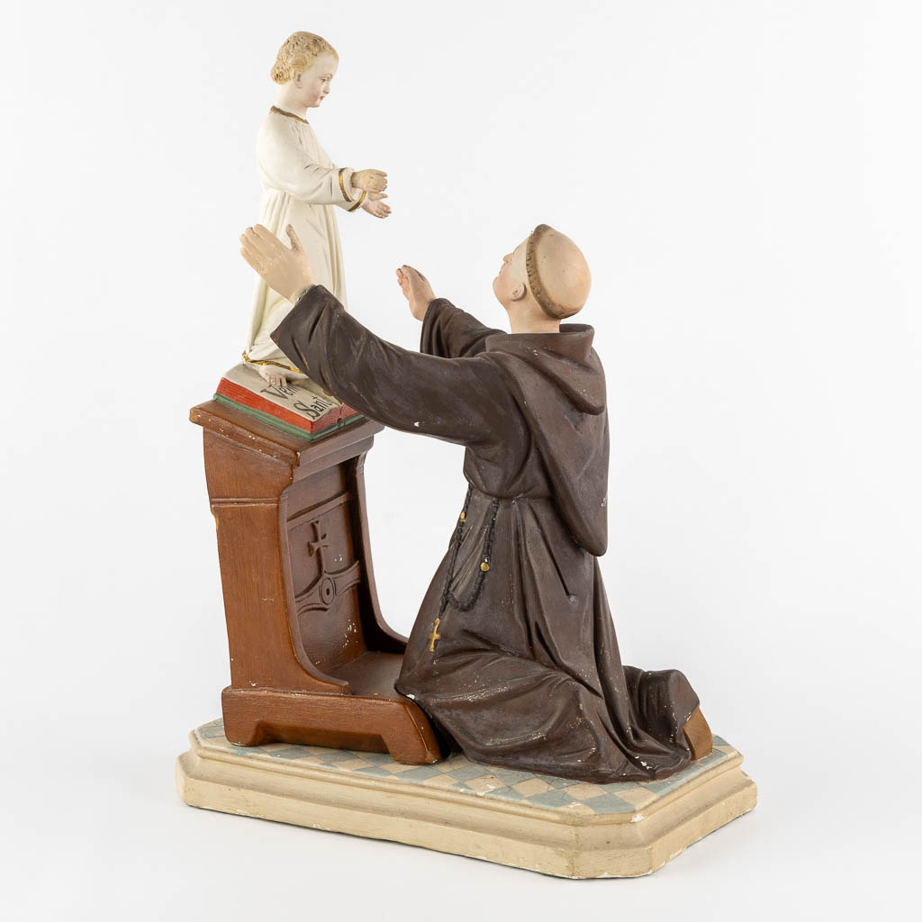 Saint Anthony with a child, polychrome plaster. Circa 1900. (L:20 x W:32 x H:44 cm)