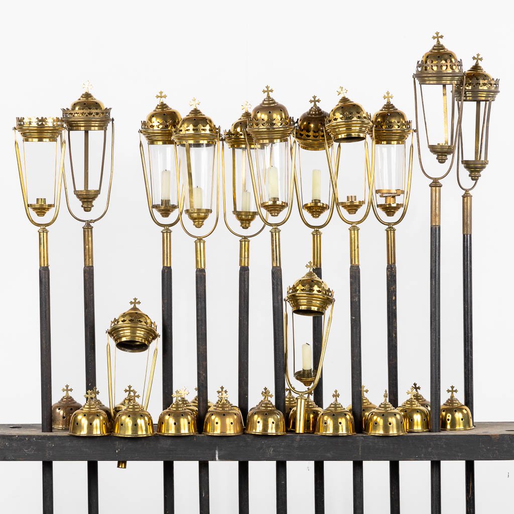 Twelve processional lanterns, brass and glass. Gothic Reivial. (H:137 cm)