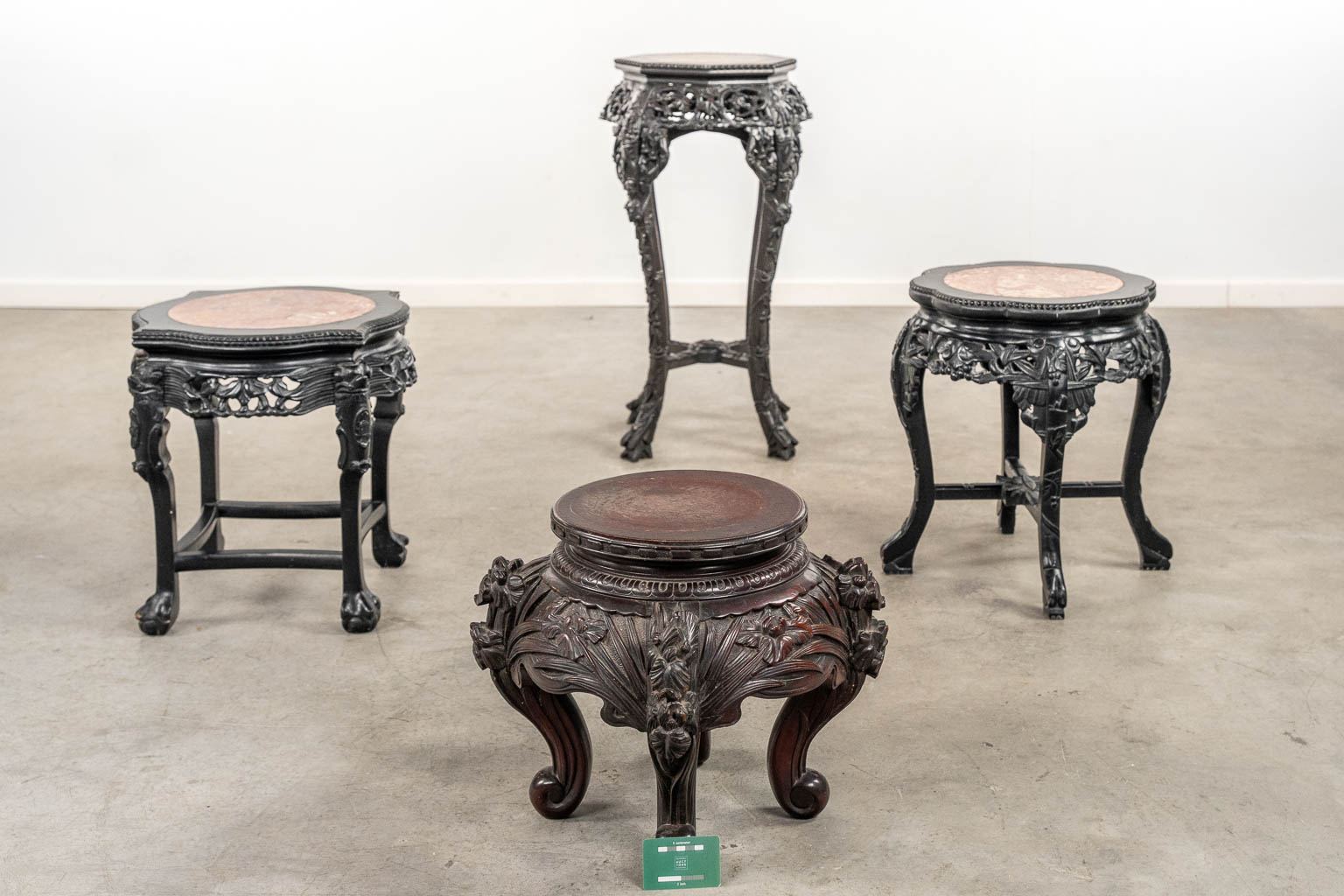 Four Chinese sculptured hardwood pedestals. (H:77 x D:43 cm)