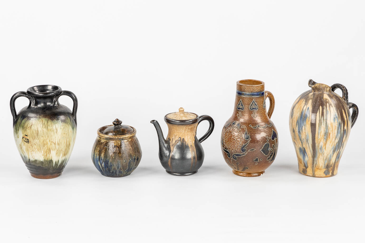 Sixteen vases and jugs, Roger Guérin, Biron, Aubrys. (H:42,5 cm)