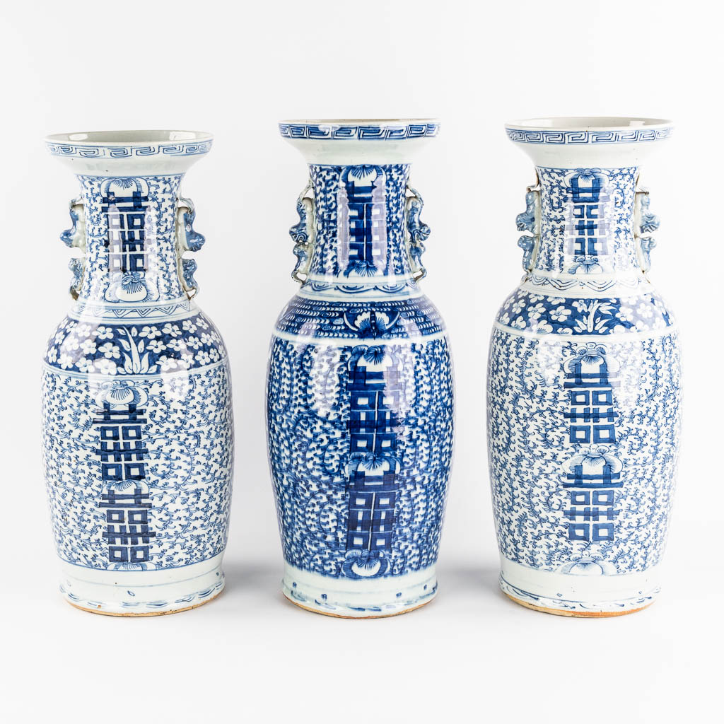 Three Chinese vases with a blue-white decor of happiness. 19th/20th C. 