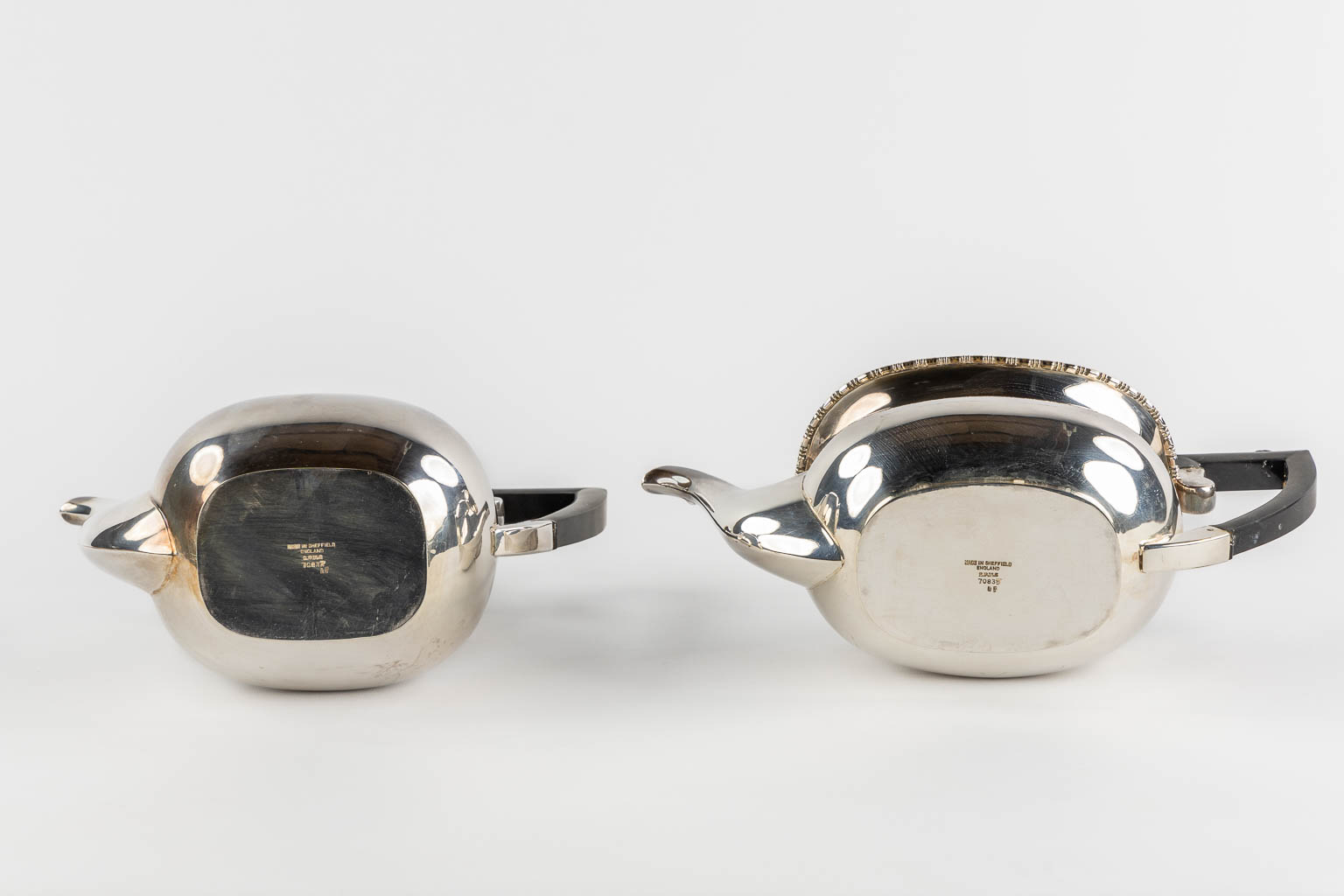 A 5-piece coffee and tea service, Silver-Plated, Sheffield UK. (L:38 x W:59 cm)