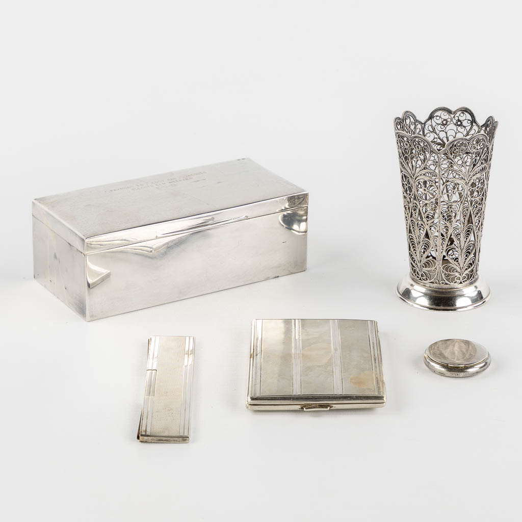 Wolfers, a silver jewellery or Cigar box, added are some silver objects. (L:8 x W:16 x H:6 cm)