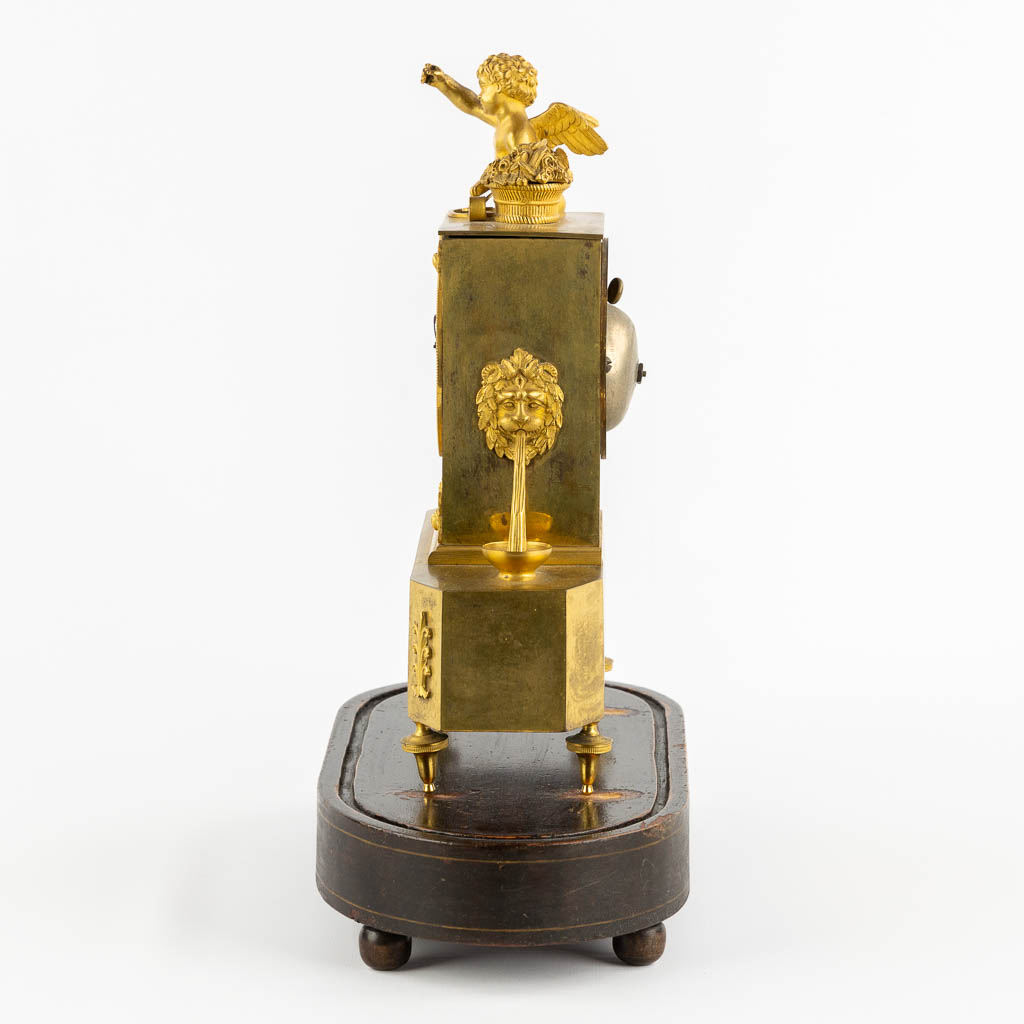 A mantle clock, Gilt bronze, Empire, 