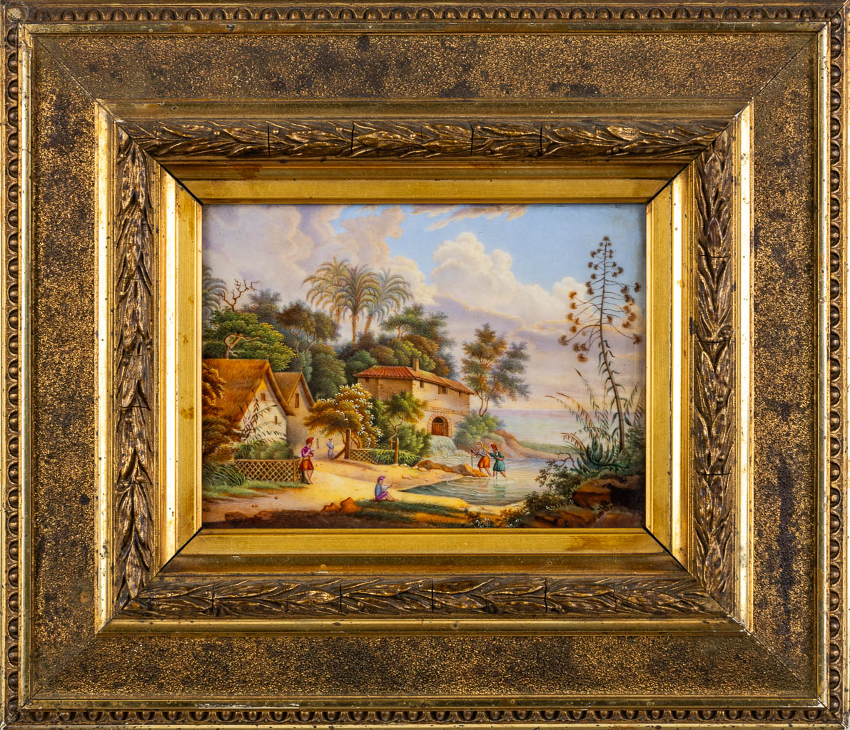 A framed porcelain plaque with a landscape scène. 19th C.