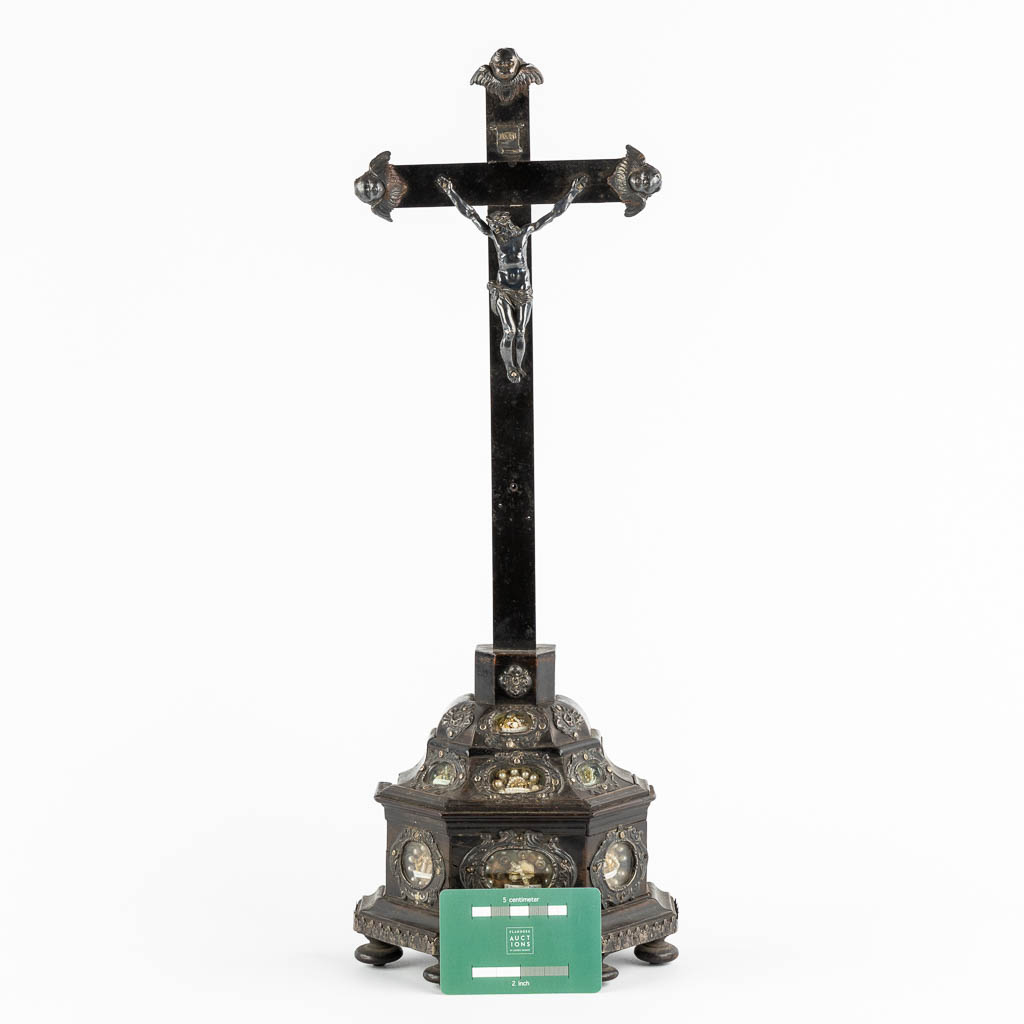 An ebonised wood Reliquary crucifix, 7 relics, mounted with silver. 19th C. (W:17 x H:50 cm)