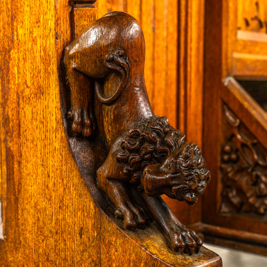 An antique organ, sculptured wood in Gothic Revival style. Circa 1900.