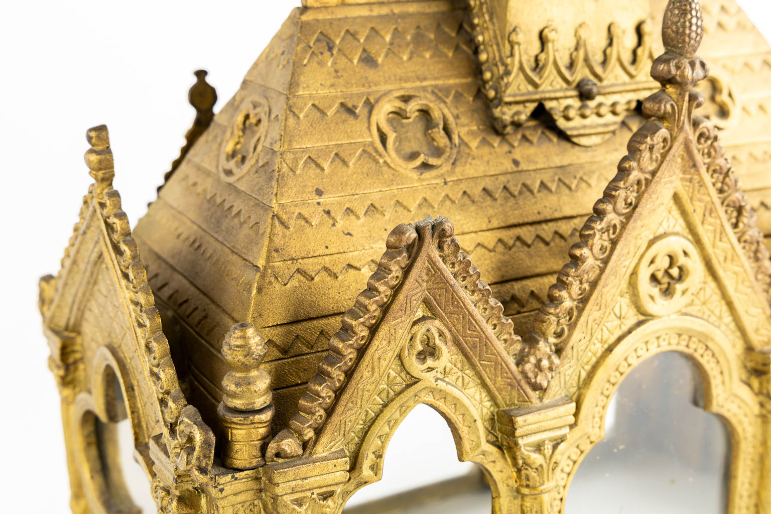 A Reliquary Shrine shaped like a Gothic Revival chapel, gilt bronze.