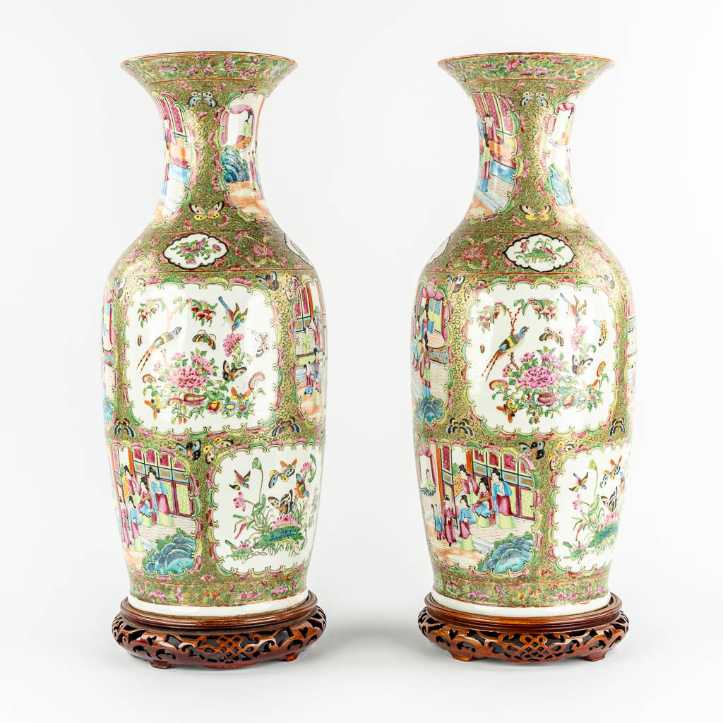 A pair of Chinese Canton vases, decorated with Ladies, fauna & flora, 19th C.