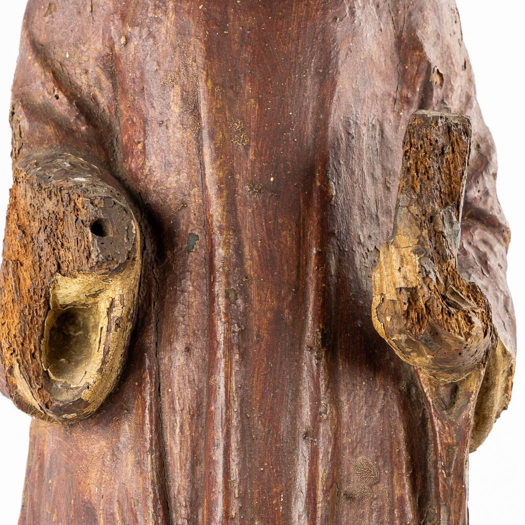 Saint Laurentius, Deacon. A wood-sculpture, oak, 14th C.  (L:20 x W:25,5 x H:90 cm)