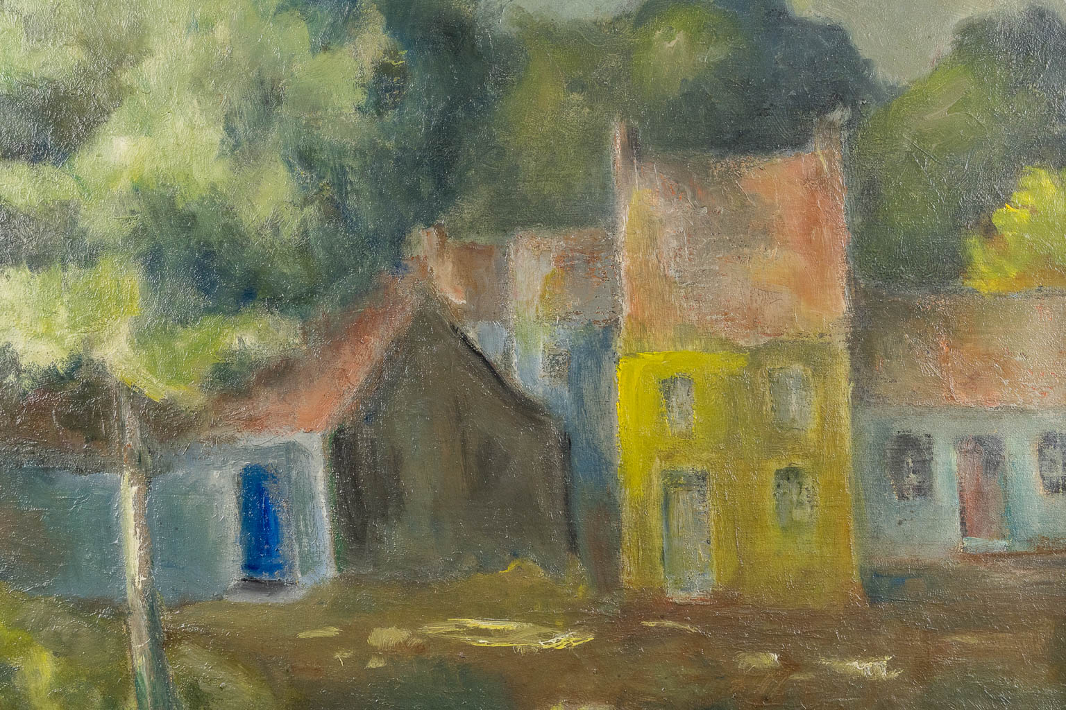 A decorative View on a village, signed J.J. Kat. Oil on canvas.