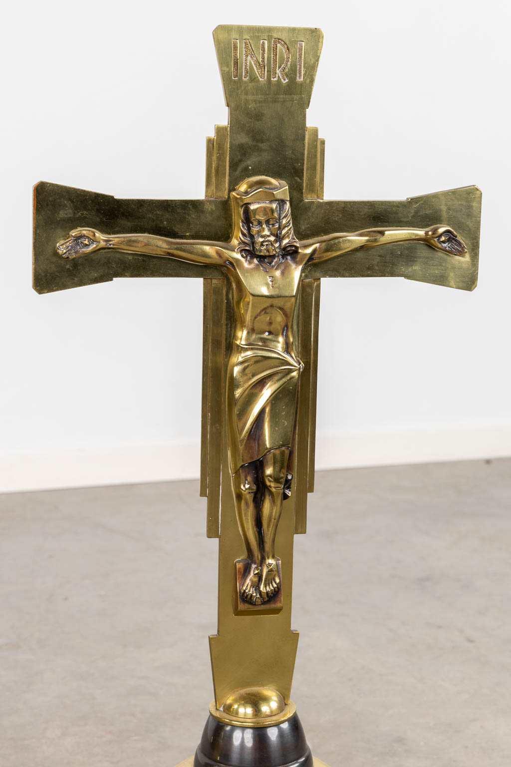 A large Altar crucifix and large church candlestick, polished bronze. (H:110 cm)