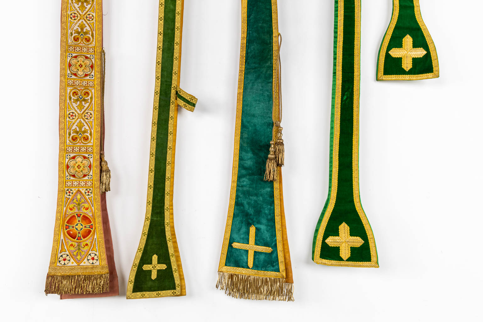 A set of Dalmatics and a Roman Chasuble, added a Chasuble and stola, maniple. Embroideries. Made around 1910.  Church use.