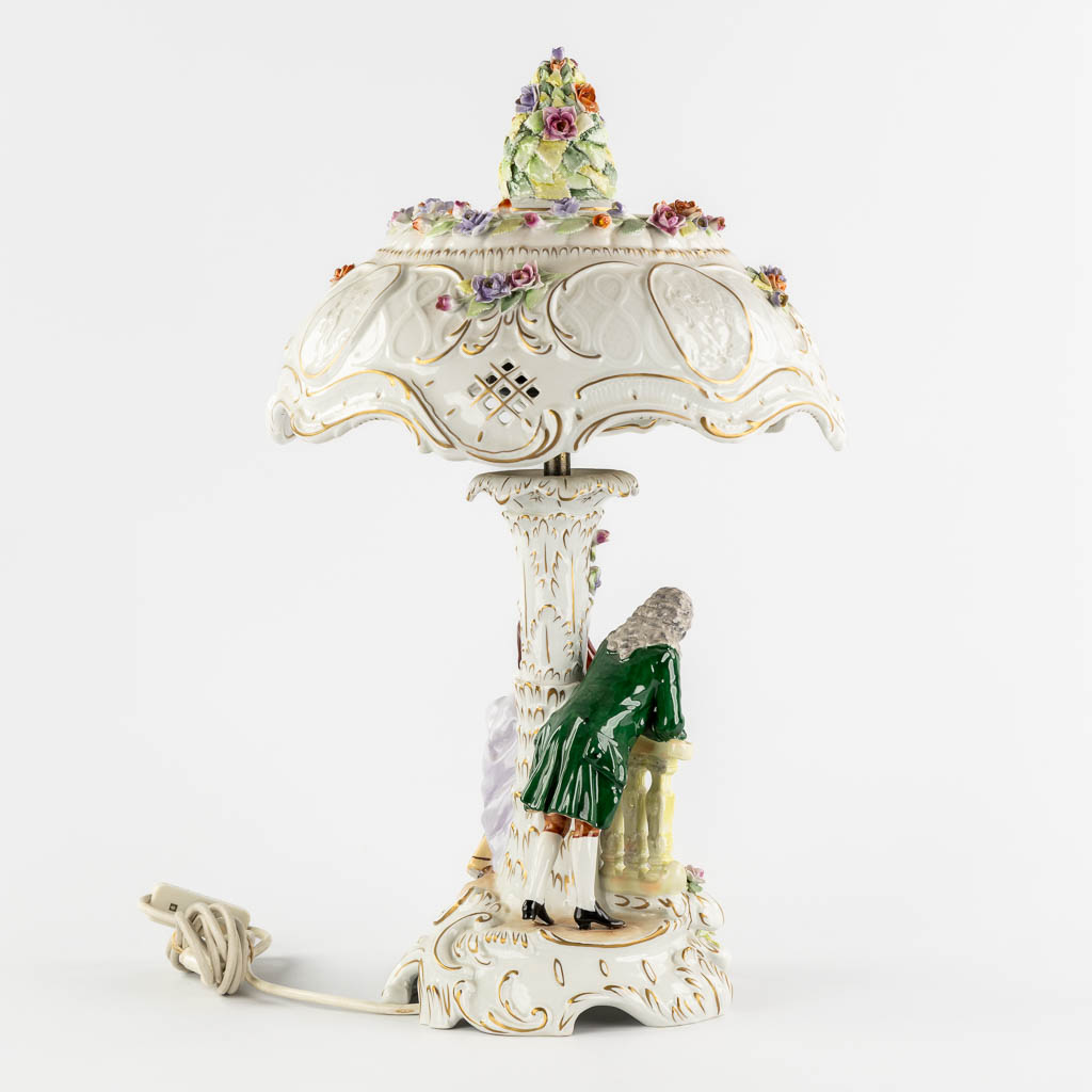 PMP, A polychrome porcelain table lamp, 20th C. (H:56 x D:34 cm)